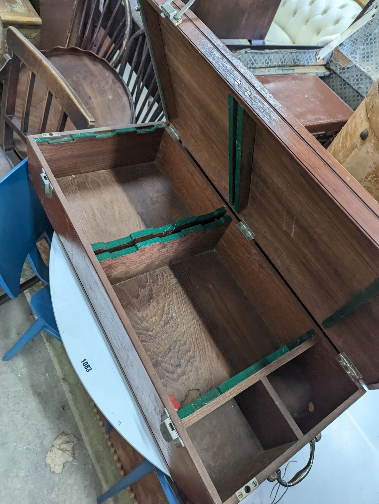 A vintage iron bound wooden travelling trunk, a suitcase, hat box, an artist travel case, and green baize compartments and a small attache case (6)